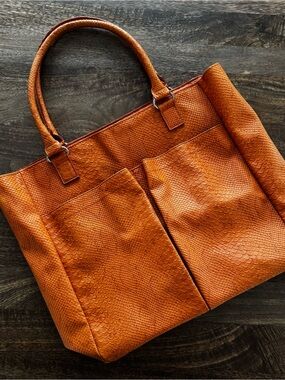 Neiman Marcus faux leather snake skin textured tote.